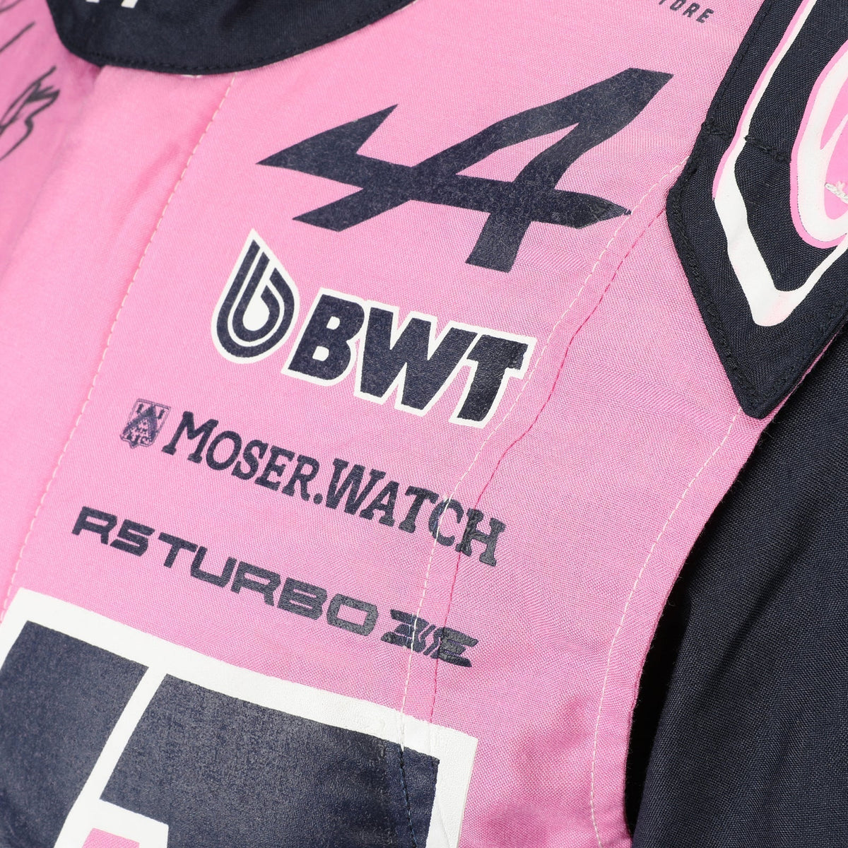 Alpine, BWT and Moser Watch chest logos on Franco Colapinto’s 2026 F1 race suit – Active Racegear.