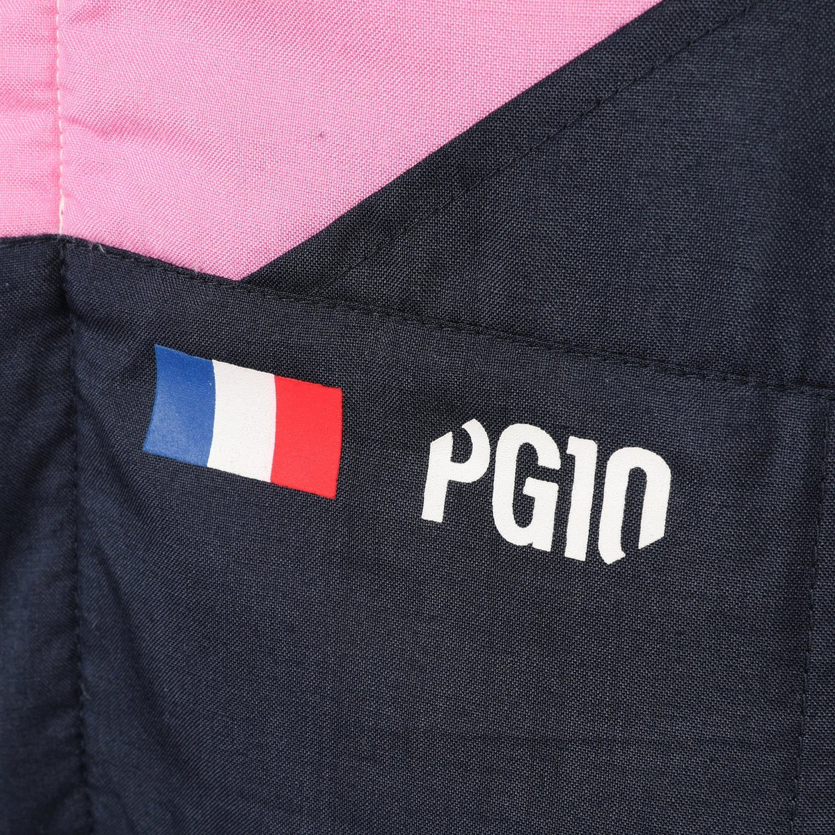 Pierre Gasly PG10 and French flag detail on the 2026 Alpine F1 race suit – Active Racegear.